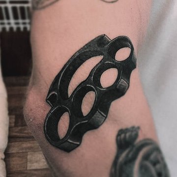 tatuaż Kastet znaczenie wzór