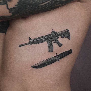 tatuaż broń znaczenie wzór