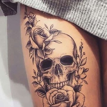 Tatuaż czaszka kobiecy z ornamentami